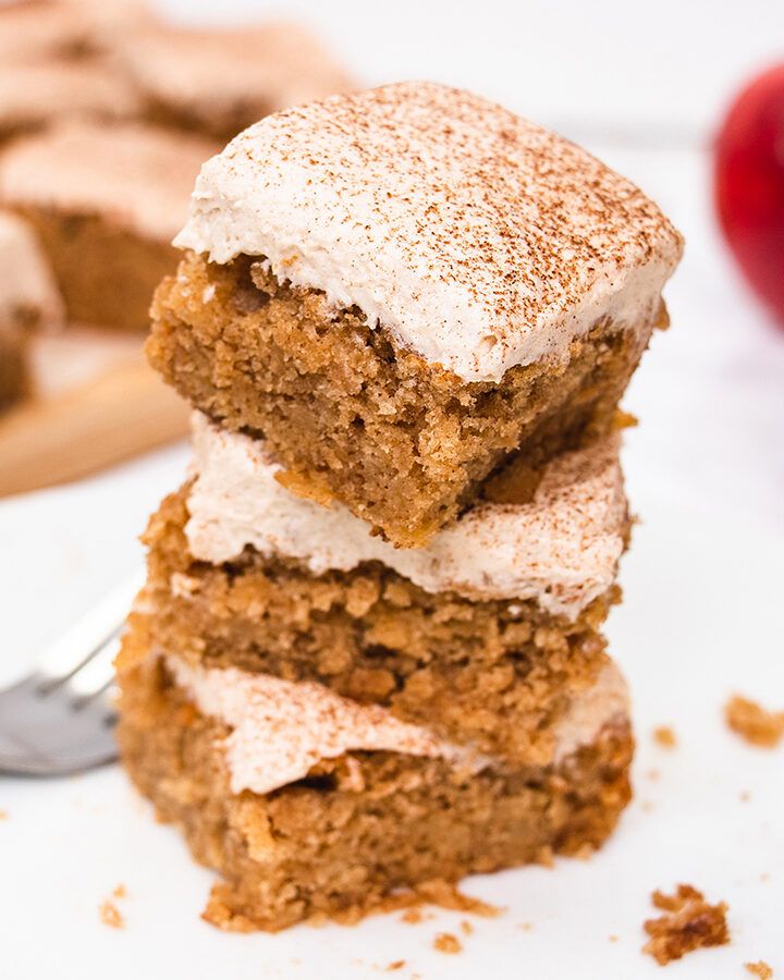 A stack of three squares of apple and cinnamon cake