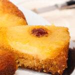 Pinterest pin graphic with text and a photo of pineapple upside down cake.