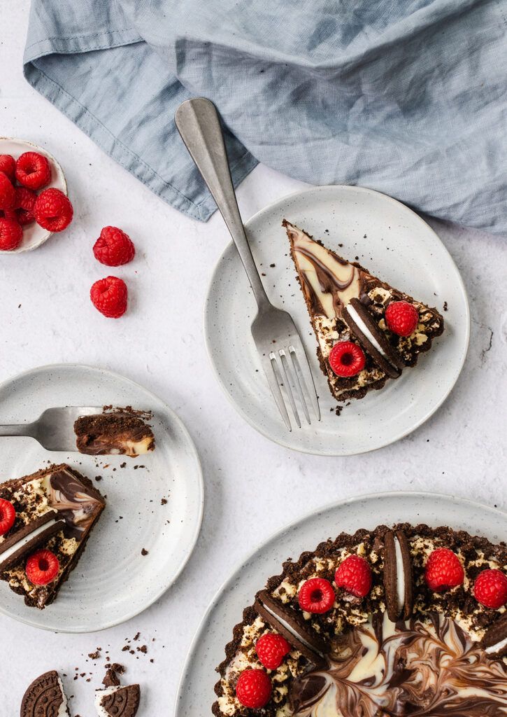 Top down view of two slices of Oreo tart, each on a plate.