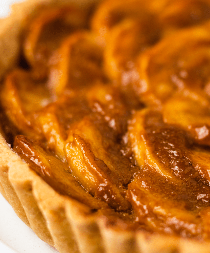 Close up view of a gluten free toffee apple tart